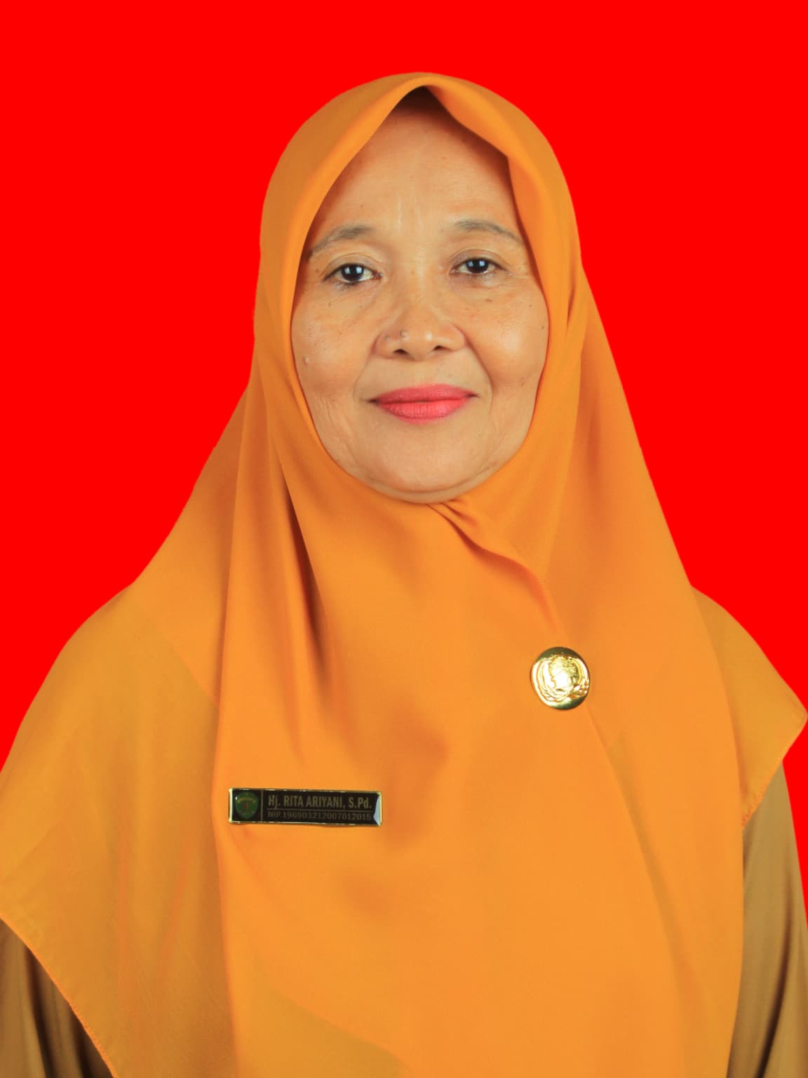 Hj. Rita Ariyani, S.Pd